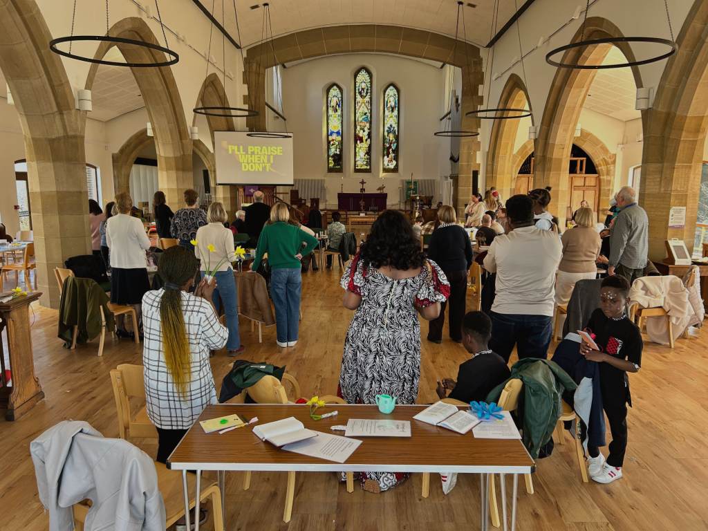 people worshipping in St Paul's